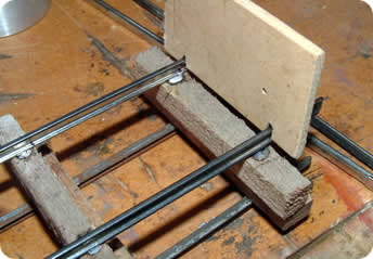 Using a spacer to position the second rail